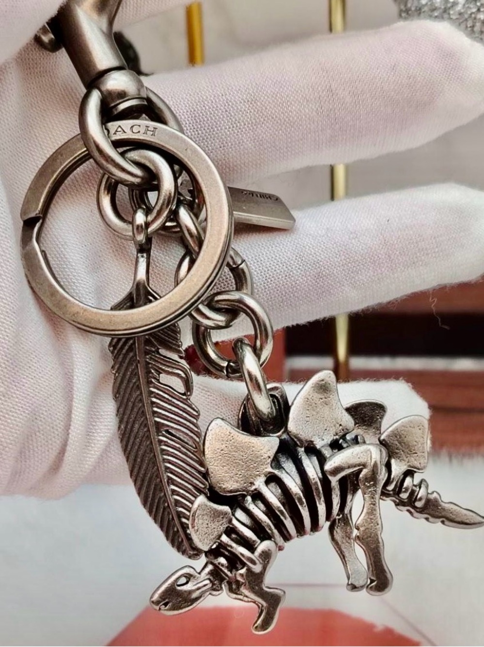 Coach Silver-Tone Steggy Stegosaurus & Feather Keyring/bag charm Like new